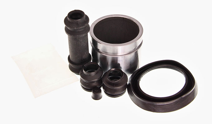 Maxgear 27-1571 - ZESTAW NAPR. ZACISKU HAM. MAZDA P. 323 1.3-1.8 16V 89-98 54MM Z TŁOCZKIEM